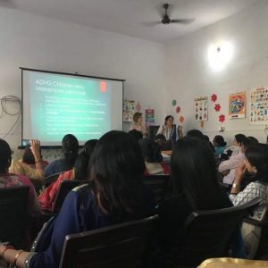 Jeannie-giving-an-ADHD-teaching-session-to-professionals-and-parents-India-2018-733x550
